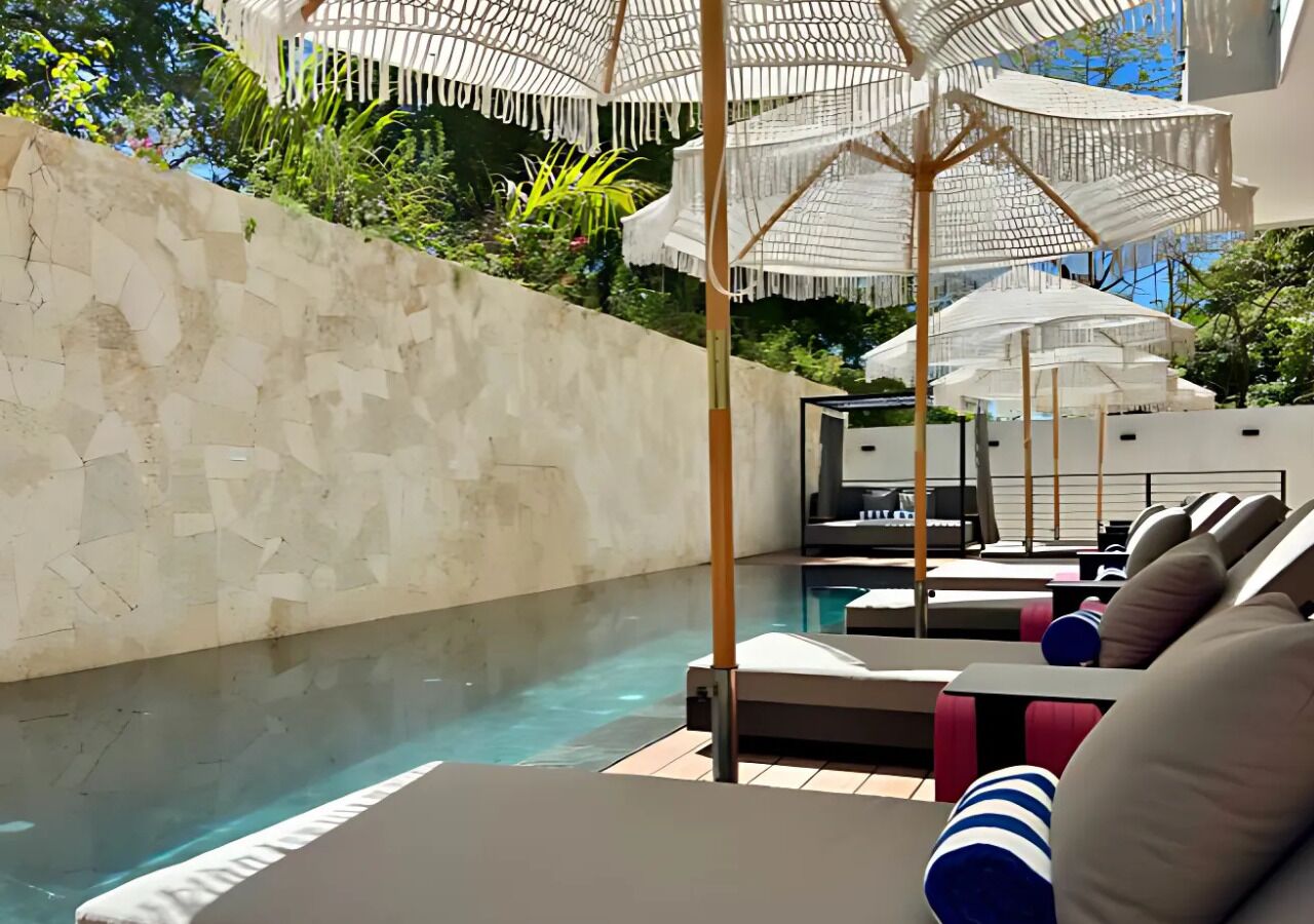 Outdoor pool, pool umbrellas, pool loungers