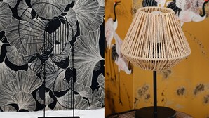 A black metal stand with a white base, a woven lamp with a beige shade, and a wall with a black and white abstract pattern. - TheBlueStay 143 - Superb cozy studio apartment (Paris)