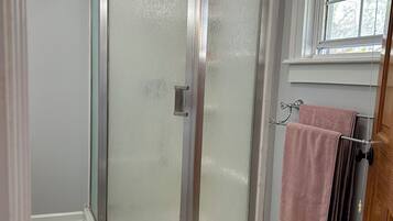 Shower, eco-friendly toiletries, hair dryer, towels