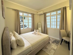 2 chambres, fer et planche à repasser, Wi-Fi, draps fournis