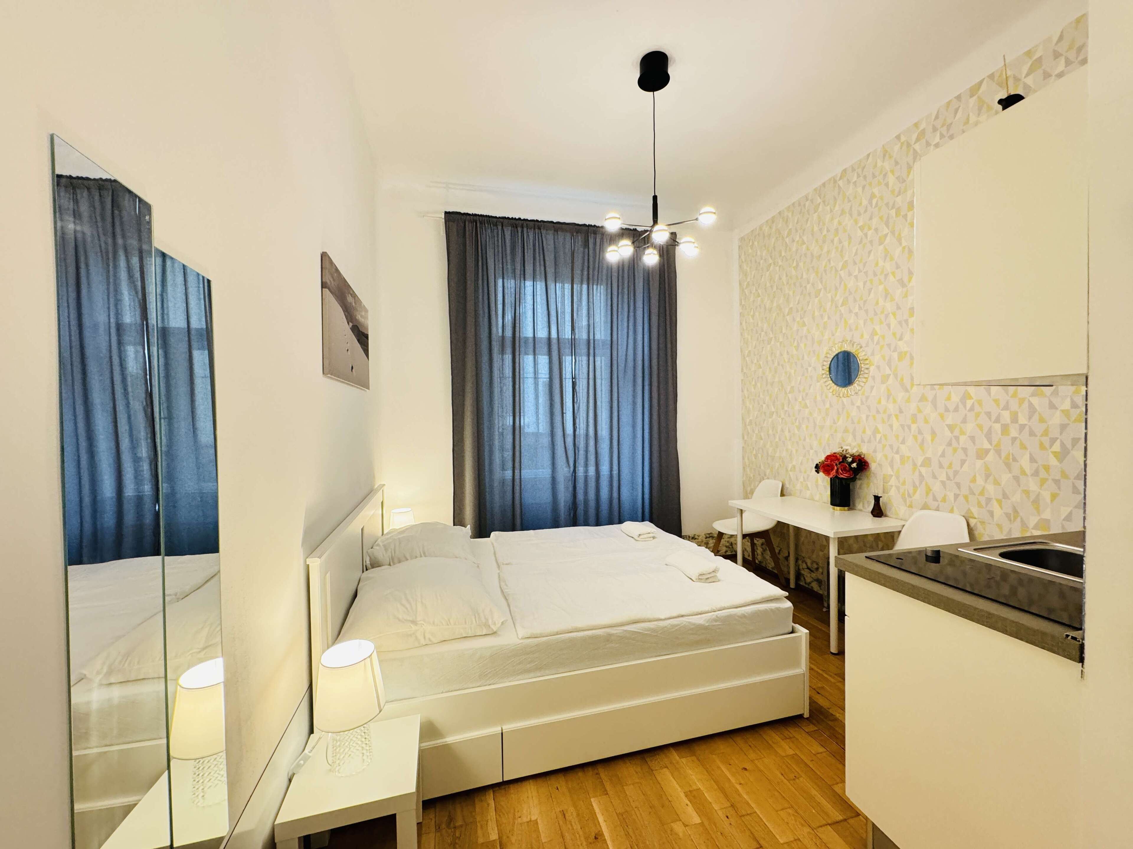 Apartment, City View, Ground Floor | Desk, laptop workspace, iron/ironing board, free WiFi