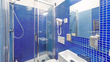 Superior Apartment, City View | Bathroom | Shower, free toiletries, hair dryer, slippers