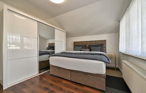 2 bedrooms, in-room safe, iron/ironing board, travel cot