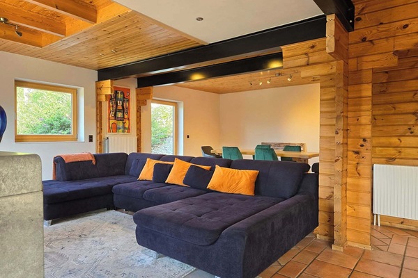 Living room with wood fire place and TV