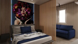 A modern bedroom with a bed, a blue sofa, a large wall mural, and a window.
