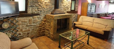 Fernseher, Kamin