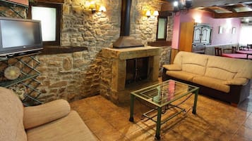 Televisor i llar de foc