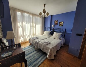 3 dormitorios, tabla de planchar con plancha, wifi gratis y ropa de cama