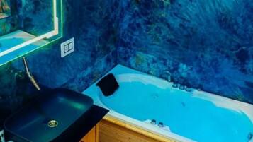 Shower, jetted tub, hair dryer, bidet