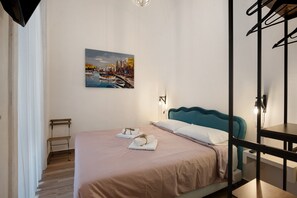 1 habitación, tabla de planchar con plancha, wifi gratis y ropa de cama 