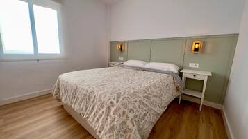 2 dormitorios, tabla de planchar con plancha, wifi gratis y ropa de cama