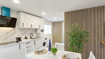 Réfrigérateur, micro-ondes, plaque de cuisson, cafetiÚre/bouilloire