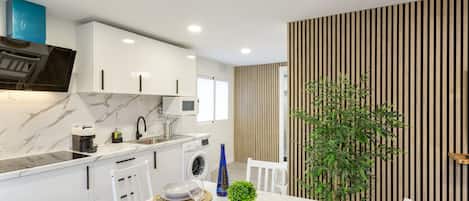 Fridge, microwave, stovetop, coffee/tea maker