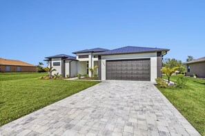 Exterior - BRAND NEW! Experience Luxury, Canal views, Heated Pool - Villa Sojourner Sanctuary -Roelens (Cape Coral)