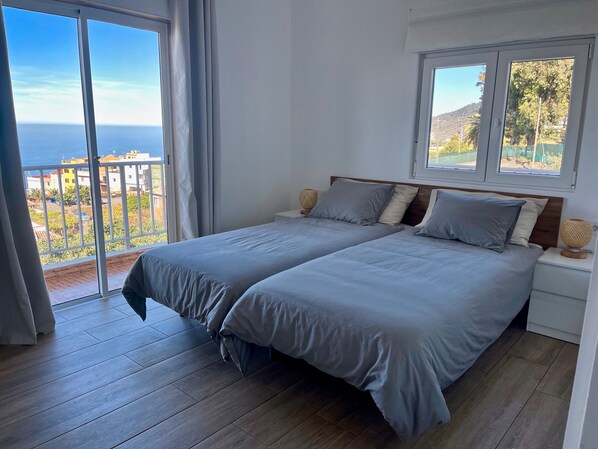 2 dormitorios, tabla de planchar con plancha, wifi gratis y ropa de cama