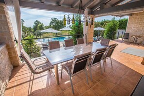 Outdoor dining - Villa with swimming pool and barbecue (Kaštelir)