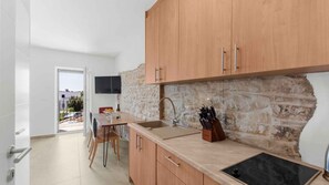 Fridge, stovetop, cookware/dishes/utensils