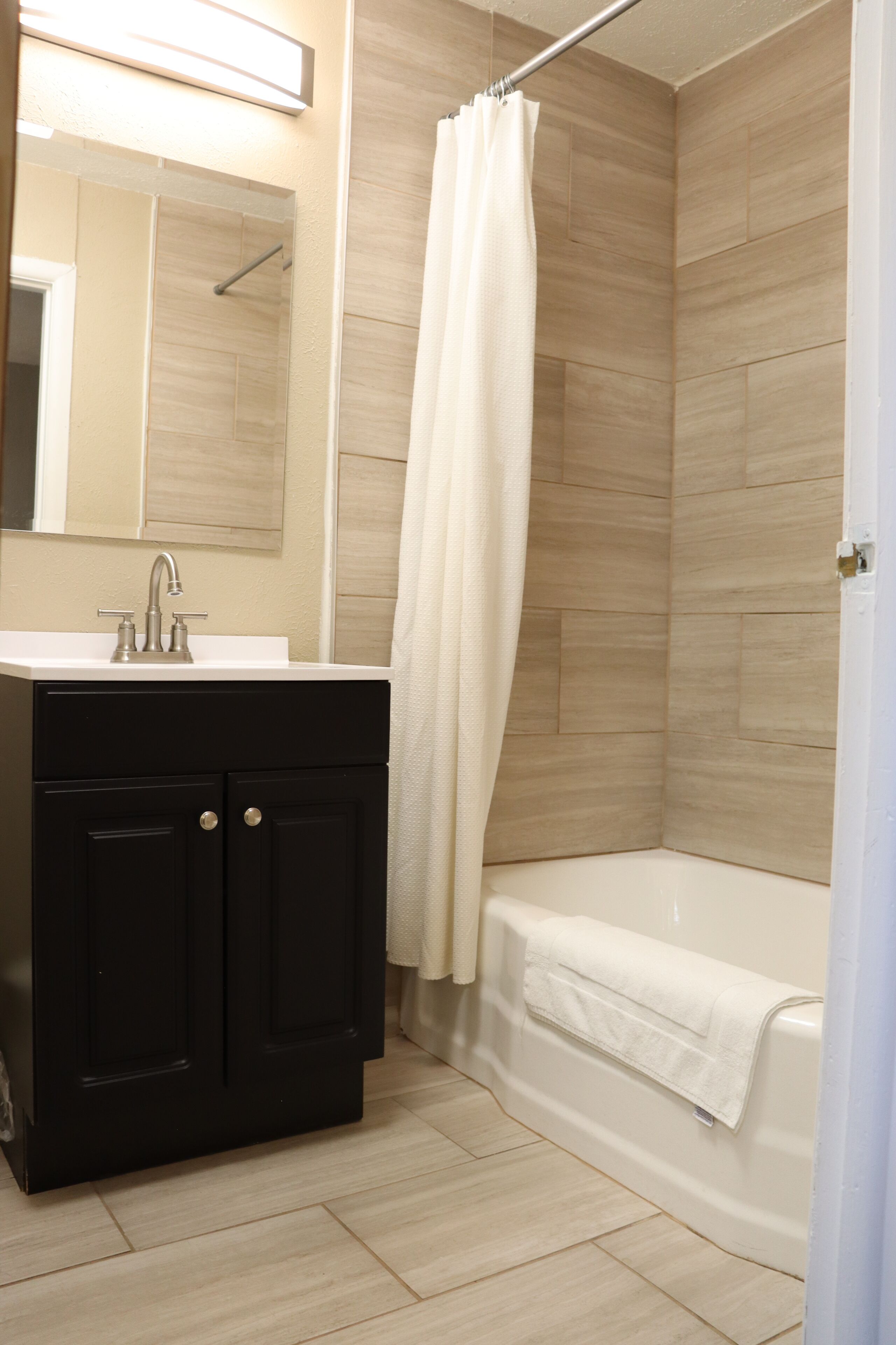 Double Room, 2 Queen Beds | Bathroom | Hair dryer, towels, soap, toilet paper