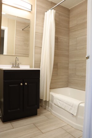 Double Room, 2 Queen Beds | Bathroom | Hair dryer, towels, soap, toilet paper