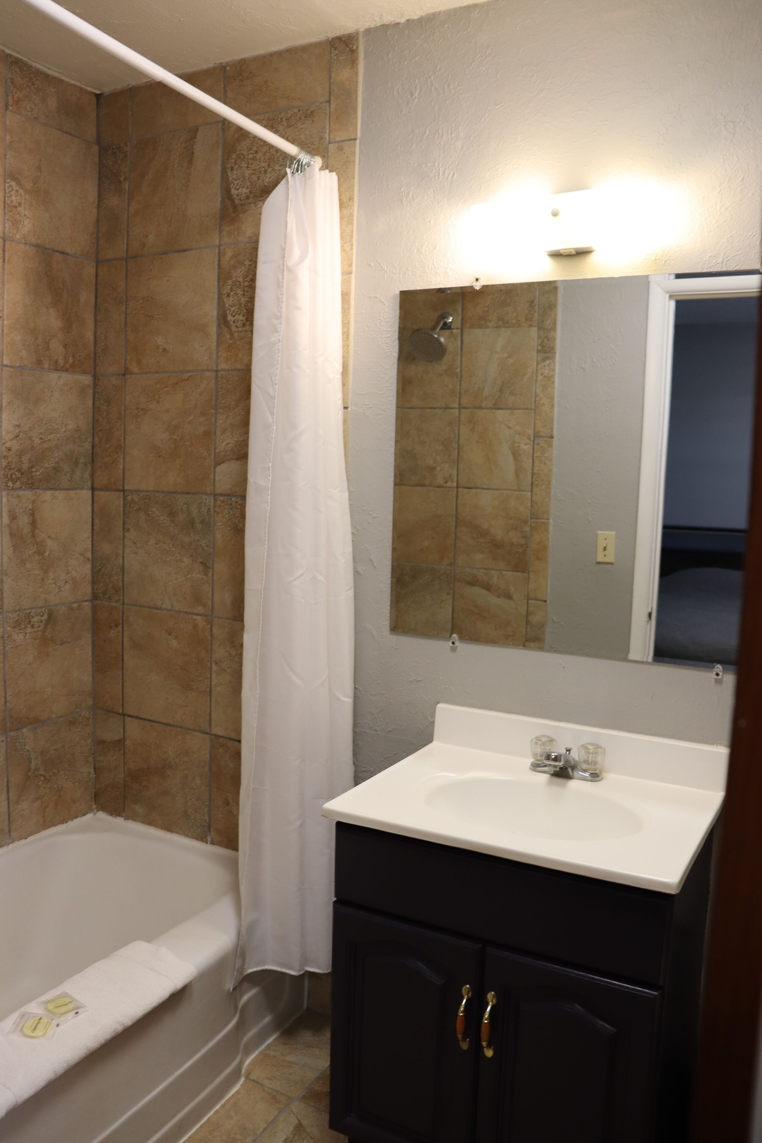 Single Room, 1 Queen Bed | Bathroom | Hair dryer, towels, soap, toilet paper