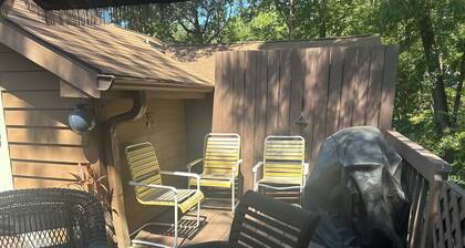 Cozy one level, 2 BR, 2 Bath TH in charming wooded community. Perfect location!