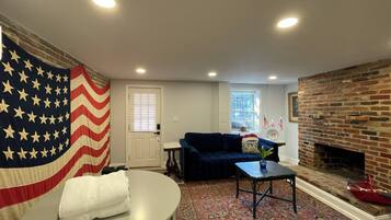 Smart TV, fireplace, books