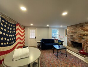 Smart TV, fireplace, books