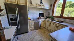 Fridge, dishwasher, toaster, cookware/dishes/utensils