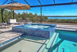 A heated pool - Casa Riva | Lagoon Front | 2 Masters | Pool | Spa | Swim up Bar | Lounge (Port Charlotte)