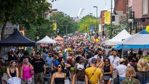 A crowded street with tents and people walking. - Mont-Royal Ave Studio · Walk to La Fontaine Park (Montreal)