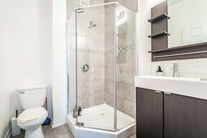 Shower, hair dryer, towels, soap