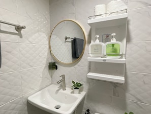 Hair dryer, towels, soap, shampoo