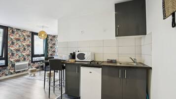 Fridge, microwave, coffee/tea maker, toaster