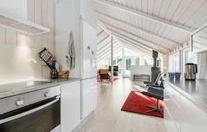 Fridge, stovetop, dishwasher, coffee/tea maker