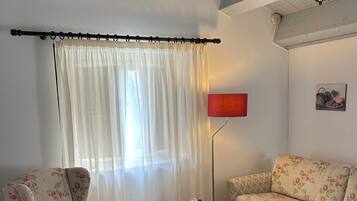 Appart'hÎtel Standard, vue jardin | Coin séjour