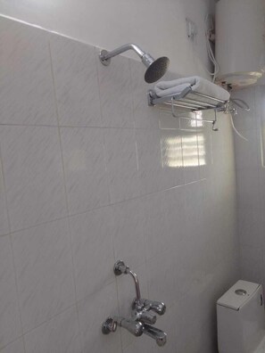 Standard Room, City View | Bathroom | Shower, towels, soap - Banaras Home Stay By GRB (Varanasi)