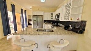 Microwave, stovetop, cookware/dishes/utensils