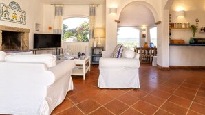 Living area - Beautiful private villa with WIFI, A/C, private pool, TV, patio, pets allowed and panoramic view (Olbia)