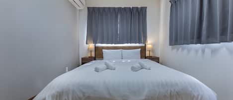 2 bedrooms, blackout curtains, iron/ironing board, free WiFi