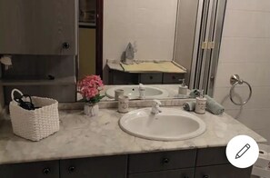 Hair dryer, bidet, towels, soap