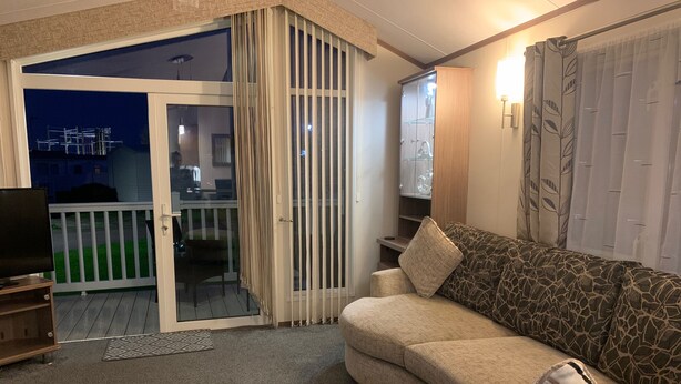 Cabin | Living area | Fireplace - Stunning 2 bed Lodge in Towyn Free Wi-fi, Parking (Abergele)