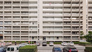 A multi-story parking garage with several cars parked in front. - 1 bedroom accommodation in NIEUWPOORT (NIEUWPOORT)
