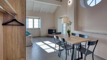 Deluxe Apartment, Sea View | Living area