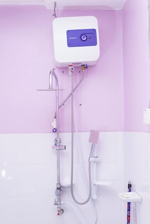 Shower, towels, soap, toilet paper