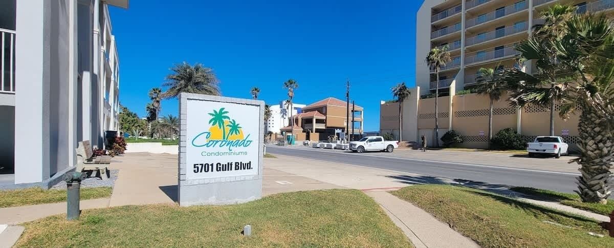 A condominium sign for Coronado at 5701 Gulf Blvd.