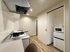 Apartamento Deluxe, balcón | Cocina privada