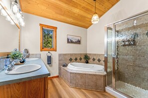 Shower, jetted tub, towels