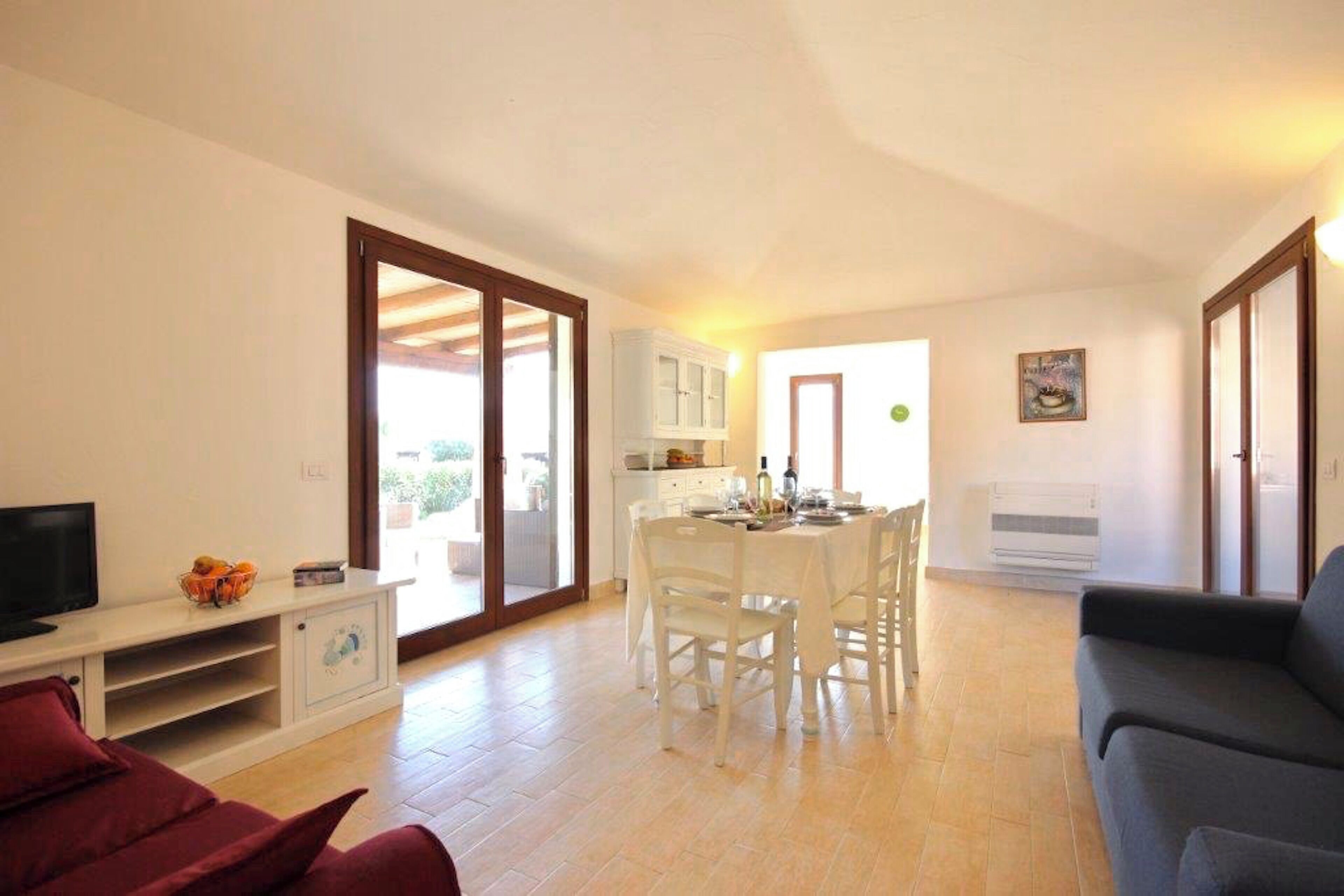 Superior Villa | Living area | 24-inch flat-screen TV with satellite channels