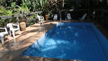 Seasonal outdoor pool, pool umbrellas