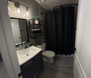 Hair dryer, towels, soap, shampoo - Modern 2 bedroom basement suite (Grande Prairie)